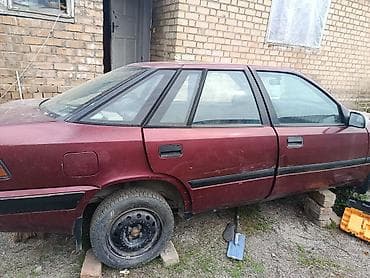 фара subaru outback: Daewoo Espero: 1996 г., Седан — 3