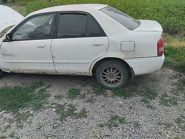 Mazda Familia: 1998 г., Автомат, Бензин, Седан — 3