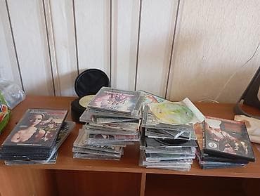 4 серия: Подборка дисков CD/DVD/BD с фильмами, сериалами и играми. Разных — 2