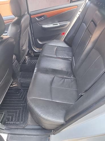 глушитель для нексия: Седан серебристого цвета с тонированными задними стеклами — 6