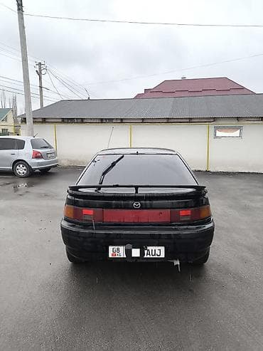 belarus mtz: Mazda 323: 1991 г., 1.8 л, Механика, Бензин, Хэтчбэк — 5