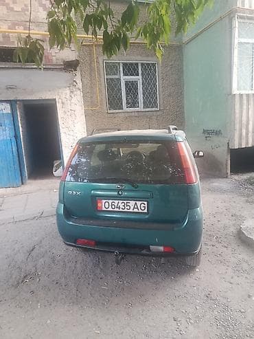 w210 e320: Suzuki Ignis: 2003 г., 1.3 л, Механика, Бензин, Минивэн — 4