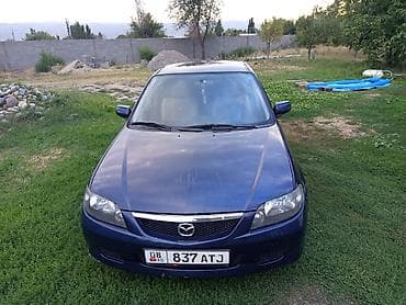 Mazda 323: 2003 г., 1.6 л, Механика, Бензин, Универсал