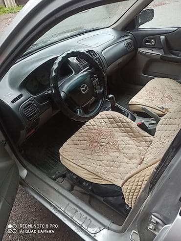 Mazda: Mazda Familia: 2002 г., 1.6 л, Механика, Бензин, Седан — 5