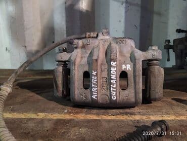 Mitsubishi Airtrek / Outlender Суппорт тормозной, Митцубиси Аиртрек /