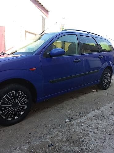 авто выхлоп: Ford Focus: 2000 г., Механика — 3
