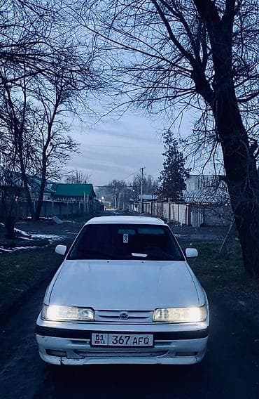 ауди 100 с: Mazda 626: 1991 г., Механика, Седан — 8