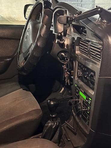 ровтер: Daewoo Nexia: 2013 г., Механика, Седан — 6