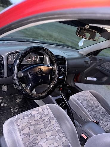 mini coper: Toyota Avensis: 1998 г., 1.6 л, Механика, Бензин, Лифтбек — 9