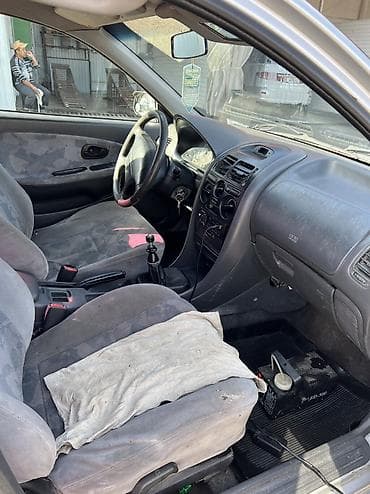 e53 4 8: Mitsubishi Carisma: 1998 г., 1.6 л, Механика, Бензин, Седан — 10