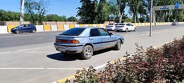 е 211: Mazda 323: 1994 г., 1.6 л, Ручные, Бензин, Хэтчбэк — 5