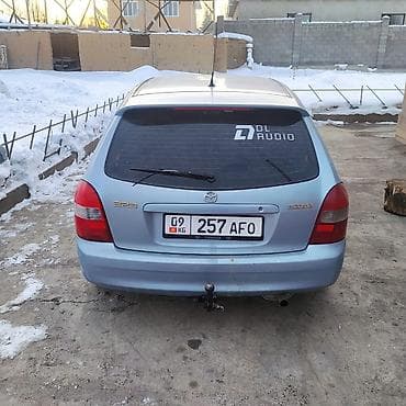 универсал мазда: Mazda 323: 2003 г., Универсал — 2