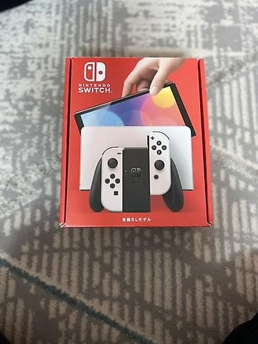 Nintendo Switch OLED (модель OLED), белый.64 гб Особенности: -