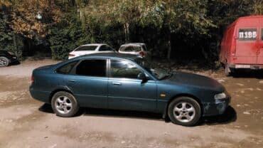 обмен на дом в городе каракол: Mazda 626: 1993 г., 1.8 л, Механика, Бензин, Хэтчбэк — 7