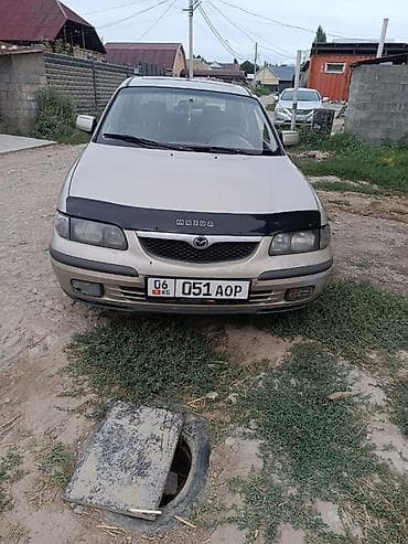 Mazda 626: 1998 г., 1.8 л, Механика, Бензин, Седан
