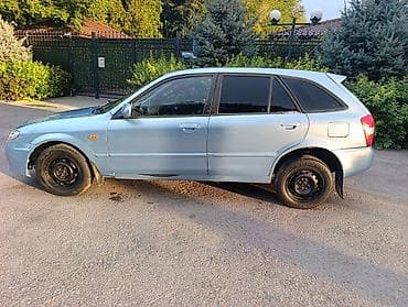bvd e2: Mazda 323: 2003 г., 1.6 л, Механика, Бензин, Универсал — 7