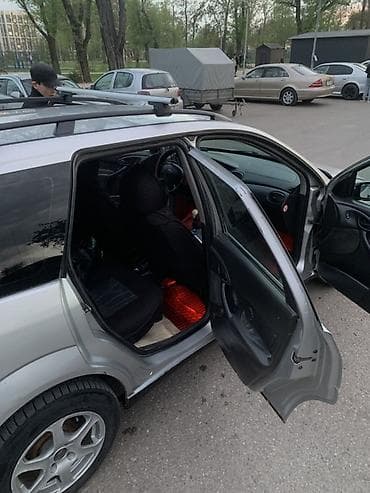 audu a4: Ford Focus: 2002 г., 1.6 л, Ручные, Газ, Универсал — 9