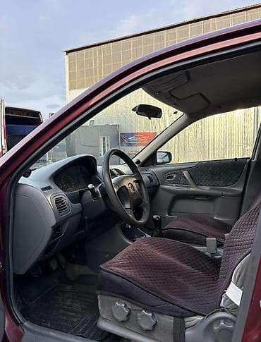 lada 2101: Mazda Familia: 1998 г., 1.5 л, Ручные, Бензин, Универсал — 7