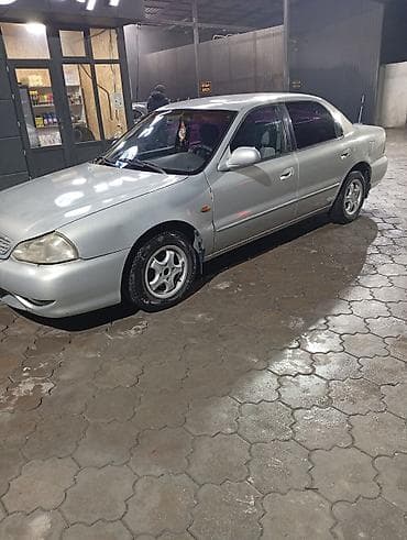 кубат: Kia Clarus: 2000 г., 2 л, Механика, Бензин, Седан — 5