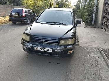Транспорт: Mitsubishi Space Wagon: 1999 г., 2.4 л, Механика, Бензин, Универсал — 1