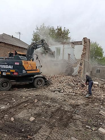 Услуги демонтажа и сноса зданий экскаватором Hyundai - Машина