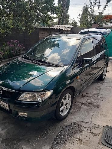 копка траншеи: Mazda PREMACY: 2000 г., 1.8 л, Механика, Минивэн — 1