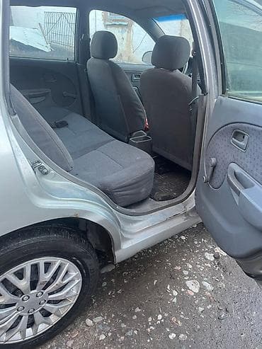 автомобиль тико: Kia Rio: 2005 г., Механика, Бензин, Хетчбек — 8