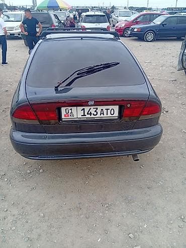 машиа: Toyota Corolla: 1995 г., Механика, Бензин, Универсал — 2