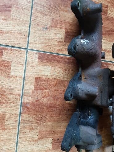 слив дождевой воды с крыши цена: Mitsubishi Pajero Delica 4D56 выпускной коллектор Митсубиси Паджеро — 1