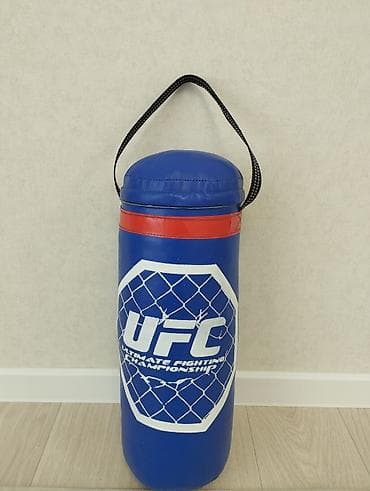 Боксерский мешок UFC Размеры:длина-55см /ширина-20см/вес примерно