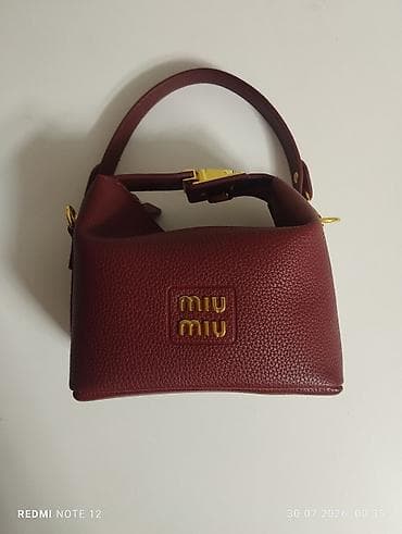 кызыл кия кыз: Сумка miu miu, вишнёвого цвета с золотыми элементами, с двумя шнурами — 1