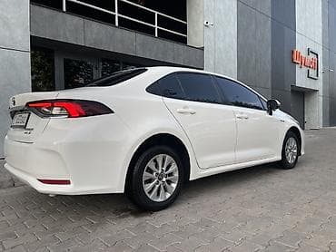 гибрит: Toyota Corolla: 2019 г., 1.8 л, Автомат, Гибрид, Седан — 5