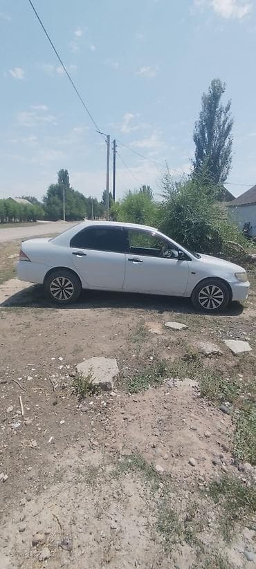 Транспорт: Mitsubishi Lancer: 2000 г., 1.5 л, Механика, Бензин, Седан — 4