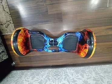 Гироскутер с внедорожными колесами и ярким принтом «Огонь и Лед» at lalafo.kg Гироскутер с внедорожными колесами и ярким принтом «Огонь и Лед»