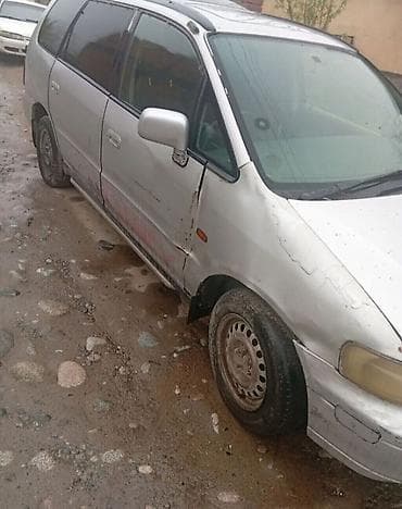 машина на вкуп: Honda Odyssey: 1994 г., 2.3 л, Автомат, Бензин, Минивэн — 3