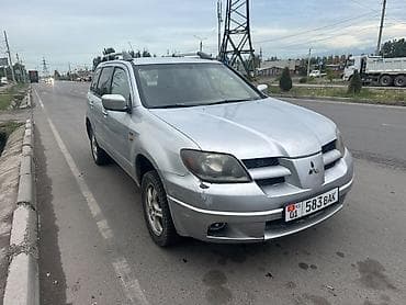 Mitsubishi Outlander: 2003 г., 2 л, Механика, Бензин, Кроссовер — 1