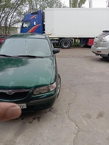 диски на форд фокус 1: Mazda 626: 1997 г., Седан — 4