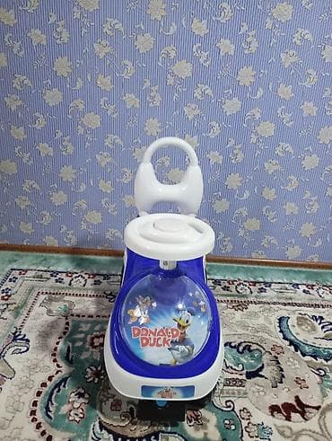 толокао: Детская машинка-каталка Donald Duck. Яркая пластиковая каталка в — 2