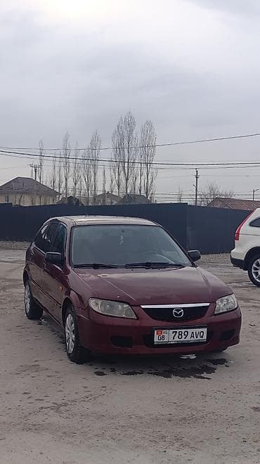 Mazda 323: 2003 г., 1.3 л, Механика, Бензин, Хэтчбэк
