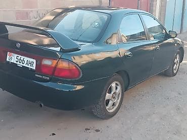 Mazda 323: 1996 г., 1.8 л, Механика, Бензин, Седан — 3