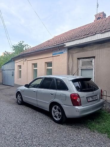 mini copper: Mazda 323: 2002 г., 1.6 л, Механика, Бензин, Хэтчбэк — 2