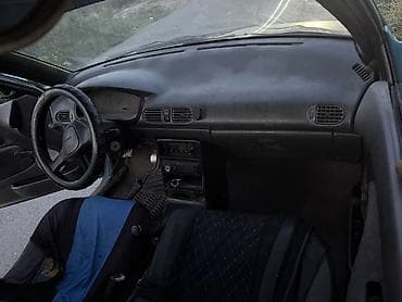 1992: Mazda 121: 1992 г., Механика, Бензин, Седан — 6