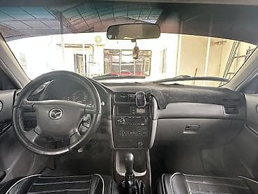 бампер mazda demio: Mazda 626: 2000 г., 2 л, Механика, Бензин, Седан — 9