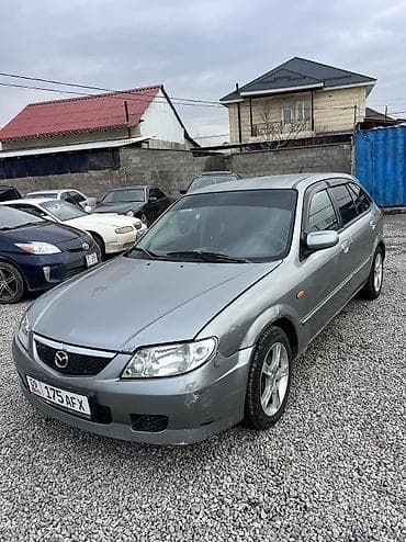 запчаст газ 66: Mazda 323: 2002 г., 1.6 л, Бензин — 5