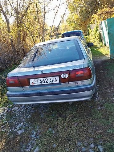 daf 480: Mazda 626: 1990 г., Бензин, Седан — 4