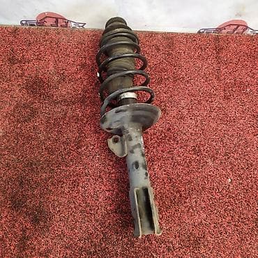талас запчаст: Амортизатор TOYOTA Ractis NCP100 2007 перед. лев. (б/у) — 1