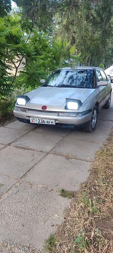 умное зеркало: Mazda 323: 1991 г., 1.8 л, Механика, Бензин, Хэтчбэк — 8