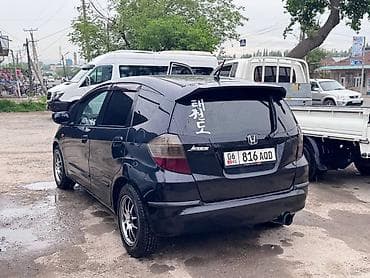 Транспорт: Honda Fit: 2009 г., 1.3 л, Механика, Бензин, Хэтчбэк — 5