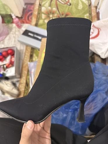 черные ботильоны на каблуке: Черные женские ботильоны-носки на каблуке. - Материал верха — 1