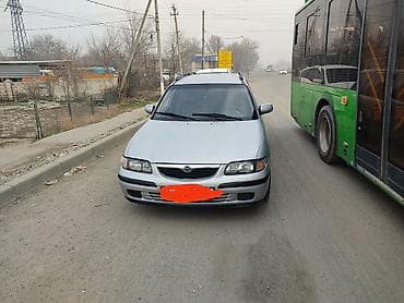 Mazda 626: 1999 г., 2 л, Механика, Газ, Универсал at lalafo.kg Mazda 626: 1999 г., 2 л, Механика, Газ, Универсал